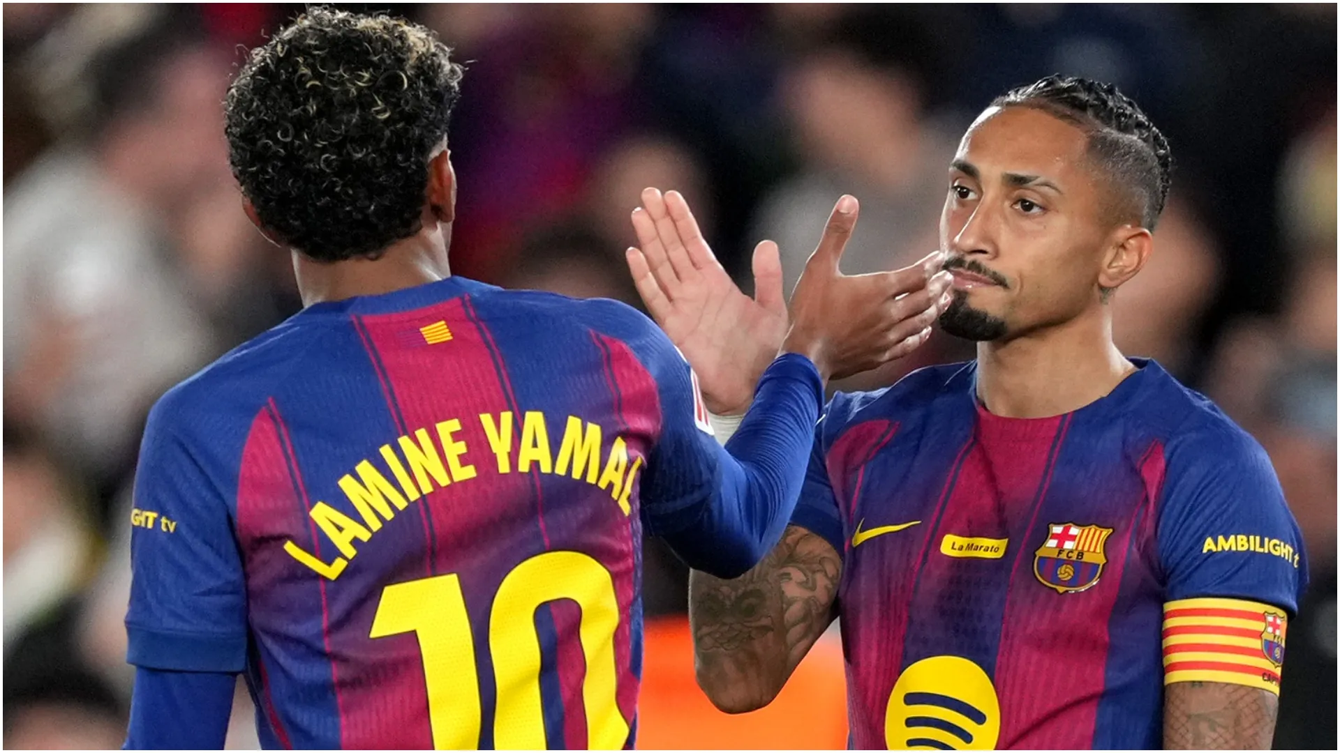 Raphinha of FC Barcelona (R) celebrates scoring his team’s first goal with teammate Lamine Yamal (L) – Alex Caparros/Getty Images