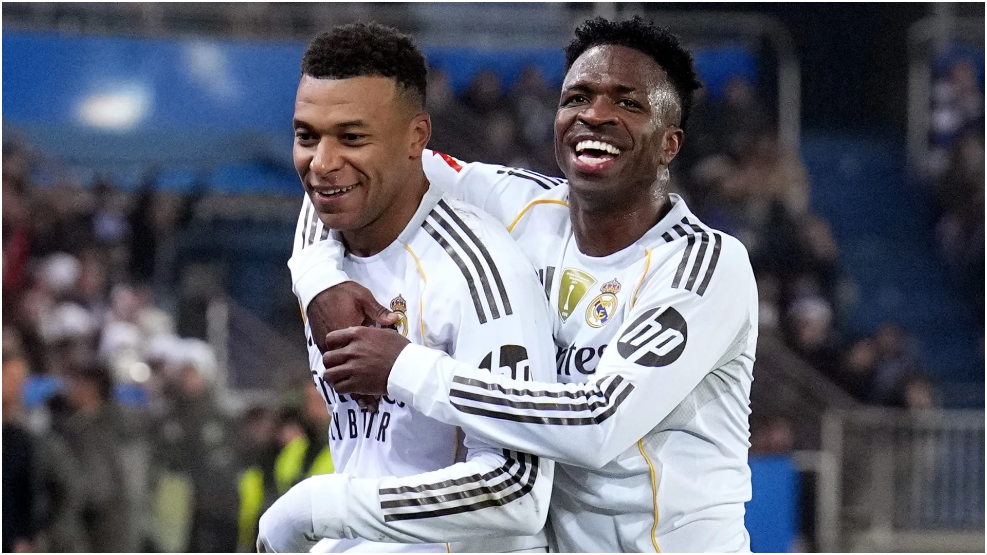 Kylian Mbappe of Real Madrid celebrates scoring his team’s first goal with teammate Vinicius Junior – Juan Manuel Serrano Arce/Getty Images