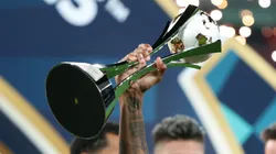Bruno Henrique of Flamengo lifts the trophy after winning the FIFA Challenger Cup 2025 match.