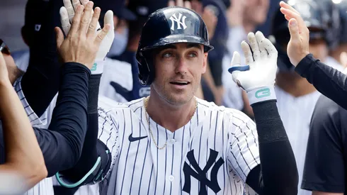 Cody Bellinger #35 of the New York Yankees celebrates his three-run home run.