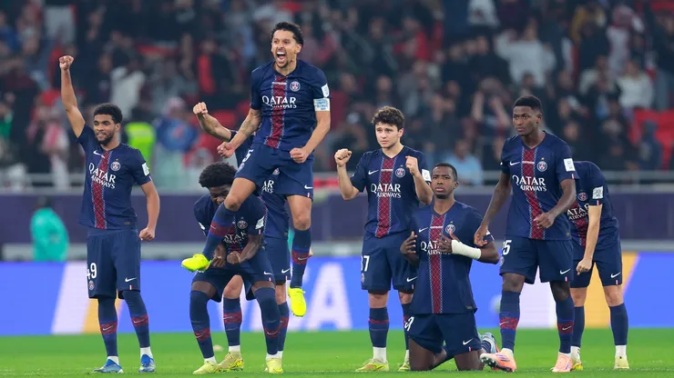 Paris Saint-Germain players celebrate during the penalty shoot out.