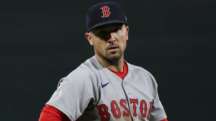 Alex Bregman #2 with the Red Sox fields against the Orioles.