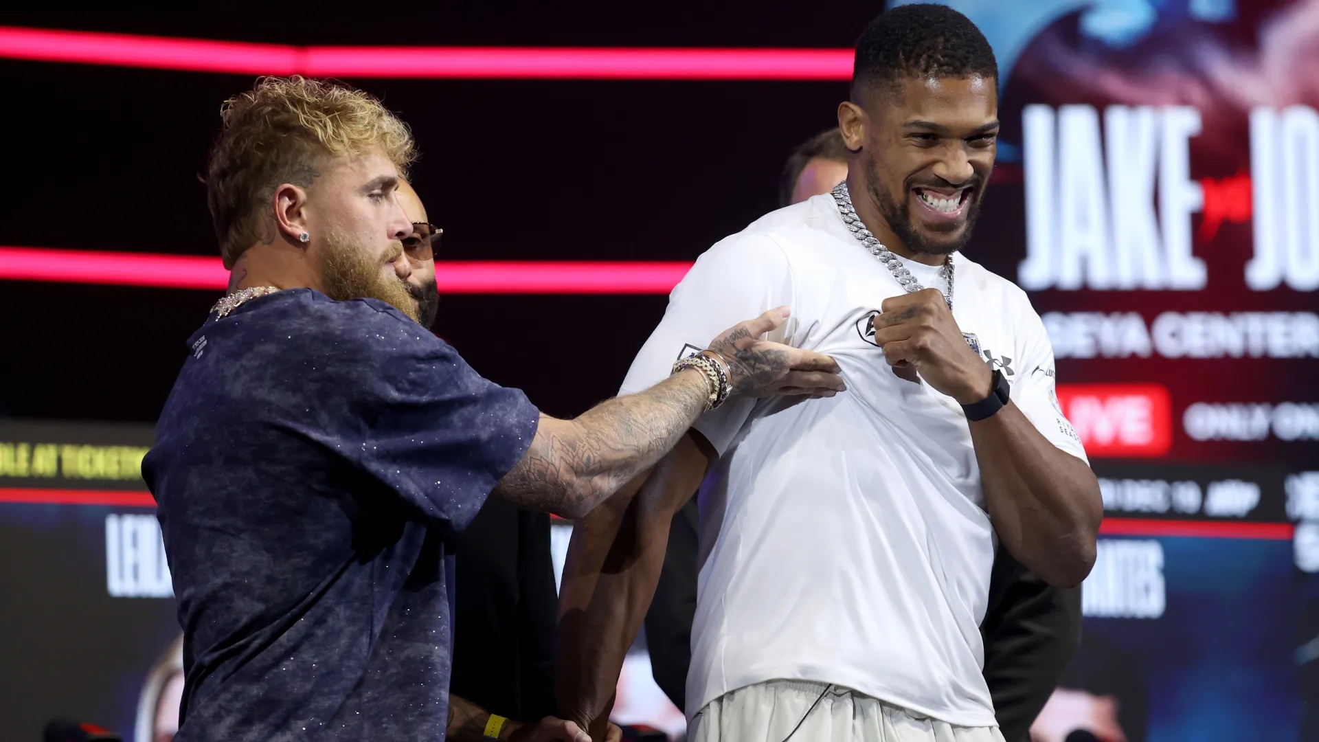 Jake Paul and Anthony Joshua face off during the press conference. Leonardo Fernandez/Getty Images