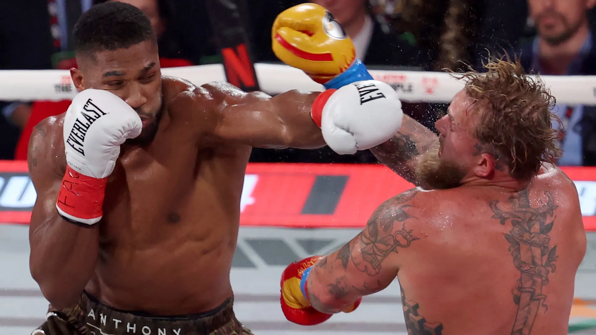 Anthony Joshua punches Jake Paul in their heavyweight bout. Leonardo Fernandez/Getty Images