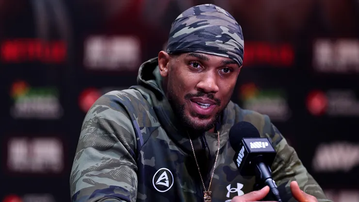 Anthony Joshua speaks at a press conference.