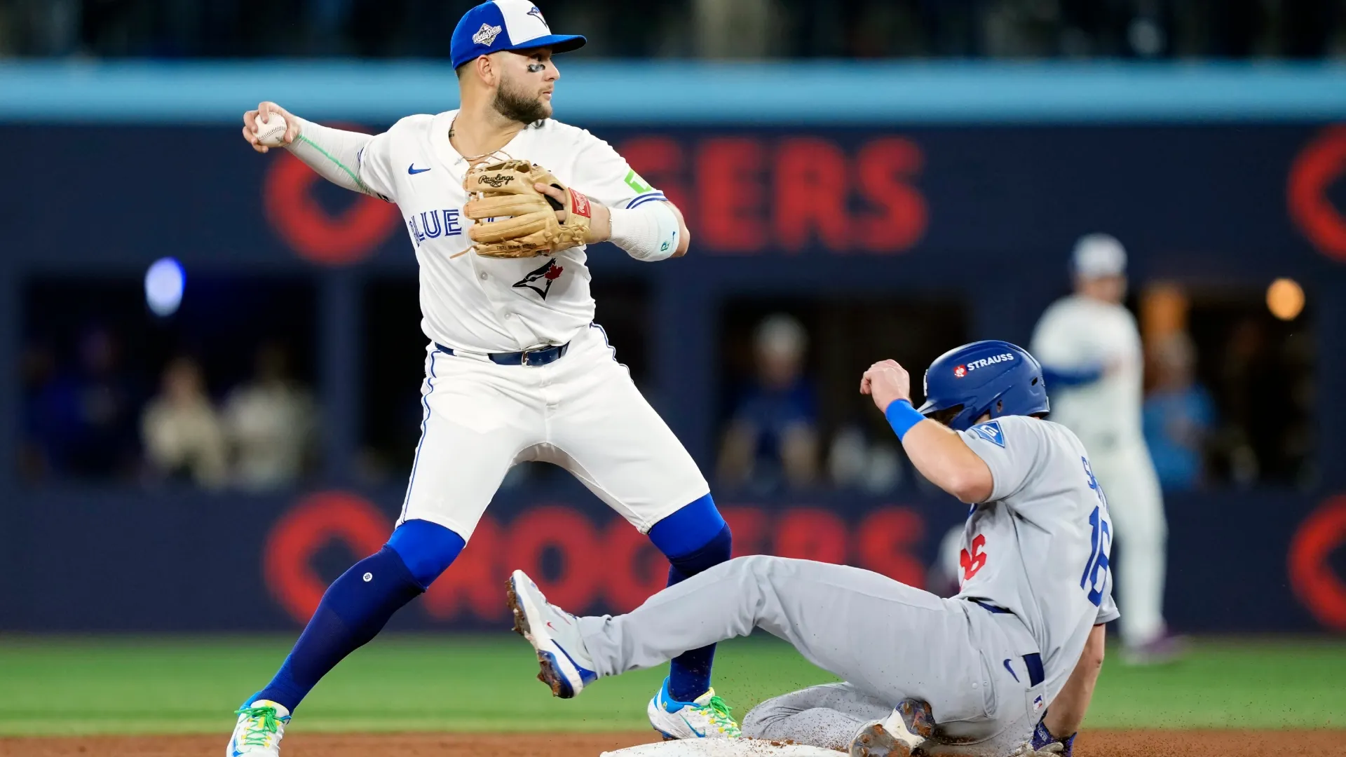 Bo Bichette #11 of the Toronto Blue Jays throws to first base. Mark Blinch/Getty Images