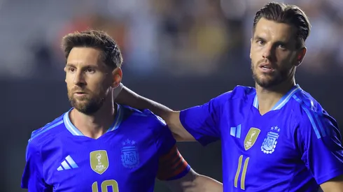 Lionel Messi and Giovani Lo Celso during a game.