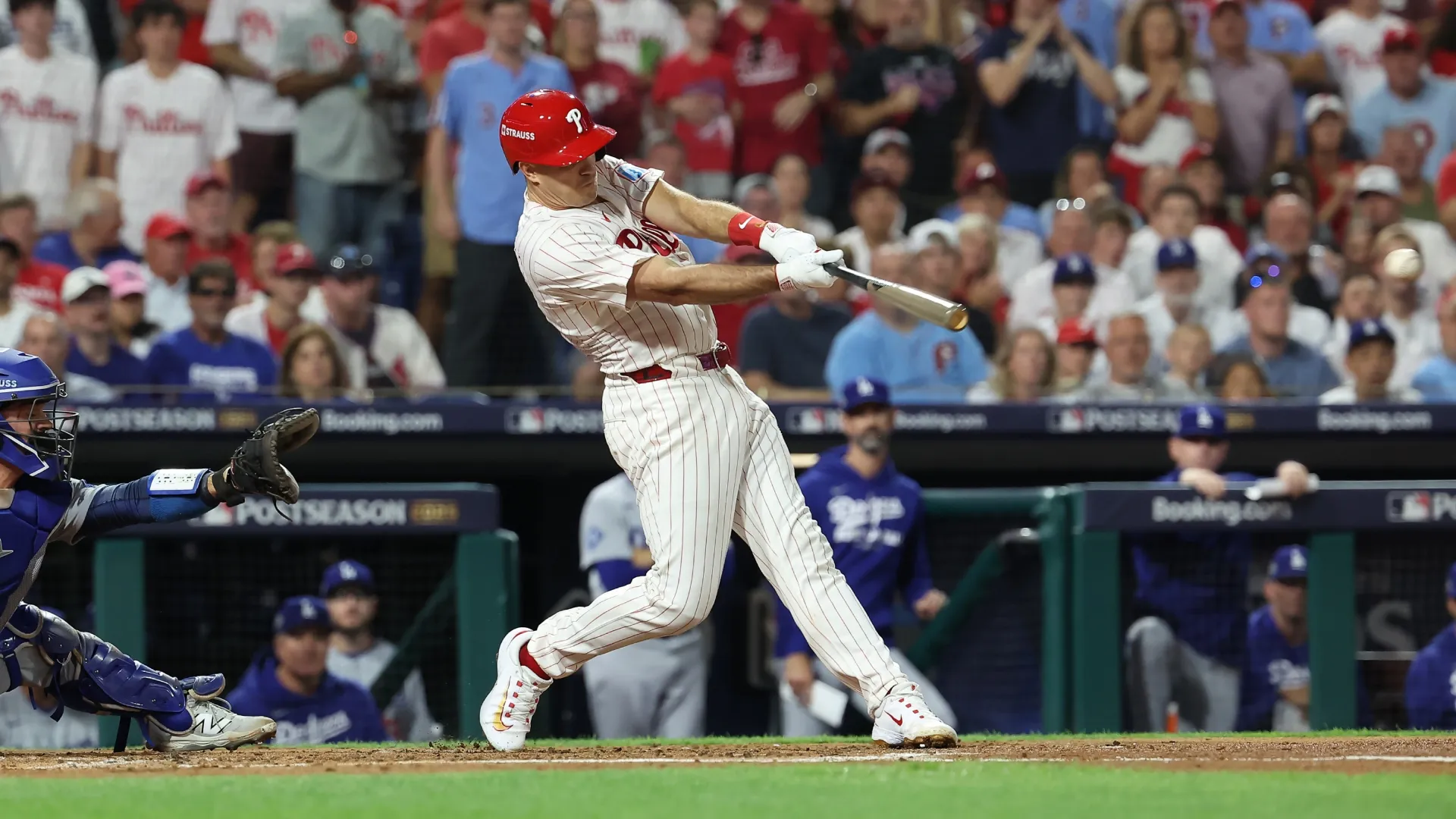 J.T. Realmuto #10 of the Philadelphia Phillies hits a triple. Hunter Martin/Getty Images