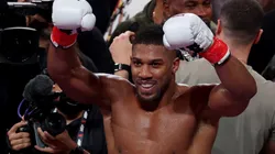 Anthony Joshua celebrates victory over Jake Paul.