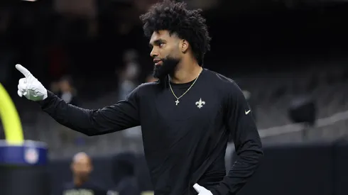Chris Olave #12 of the New Orleans Saints warms up.