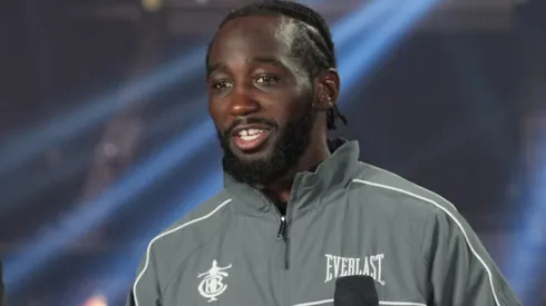 Terence Crawford poses with his undisputed super middleweight title belt.