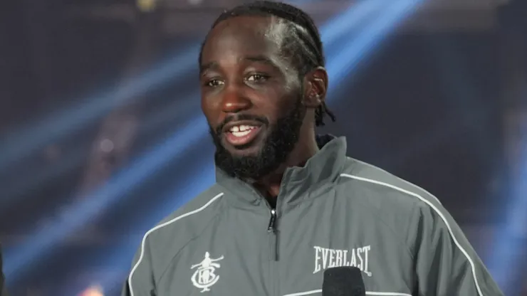 Terence Crawford poses with his undisputed super middleweight title belt.