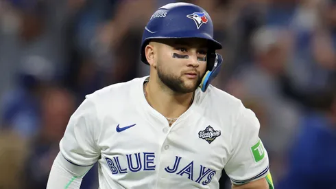 Bo Bichette #11 with the Blue Jays hits a three-run home run during the 2025 World Series.