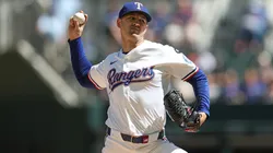 Tyler Mahle #51 of the Texas Rangers throws a pitch.