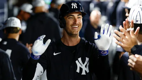 Cody Bellinger #35 of the New York Yankees celebrates in the dugout.