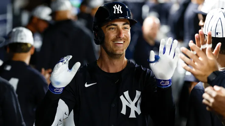 Cody Bellinger #35 of the New York Yankees celebrates in the dugout.