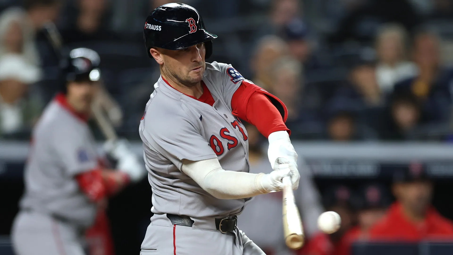 Alex Bregman #2 of the Red Sox hits a single. Ishika Samant/Getty Images