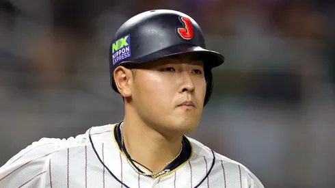 Kazuma Okamoto of Team Japan runs to first base on March 20, 2023 in Miami.