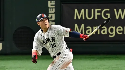 Kazuma Okamoto celebrates hitting a three run home run on March 16, 2023 in Tokyo.