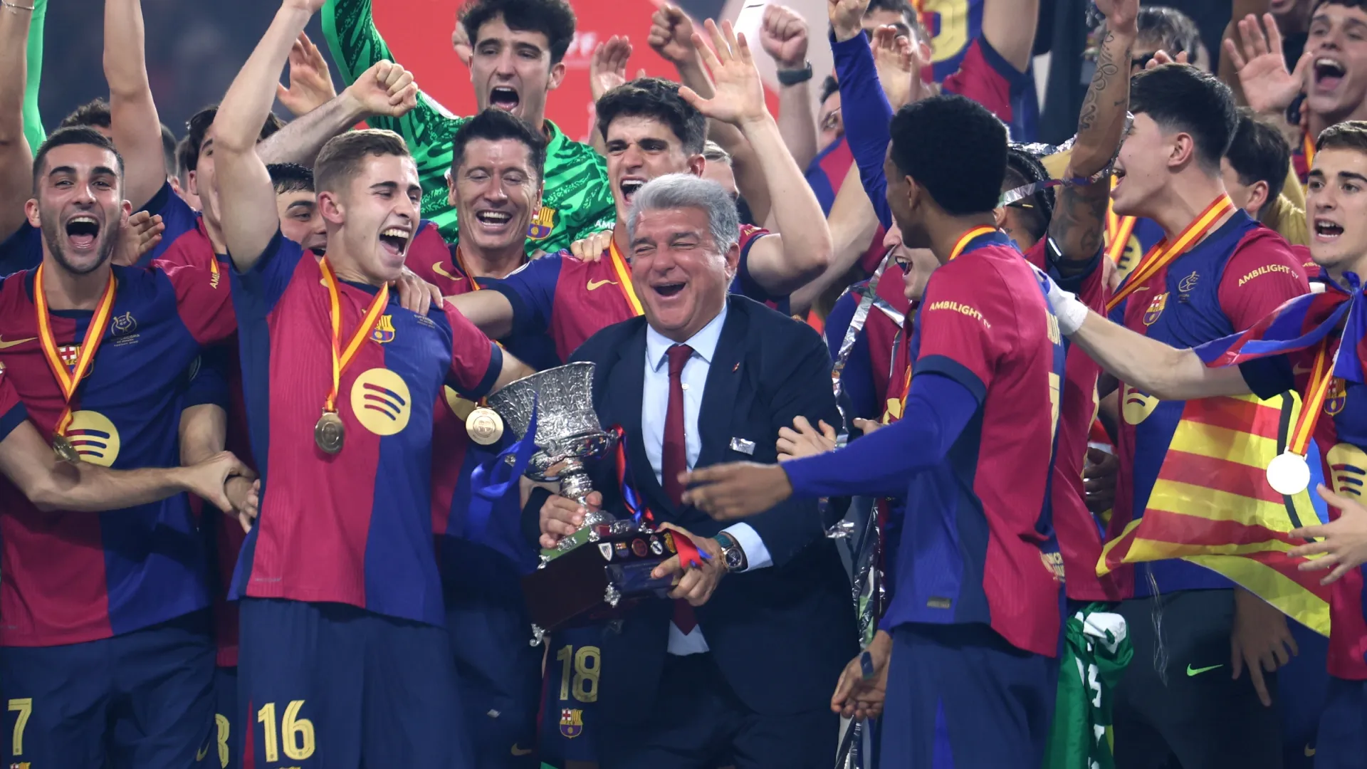 Joan Laporta, President of FC Barcelona, celebrates with the Supercopa de Espana winners’ trophy in 2025. (Source: Yasser Bakhsh/Getty Images)