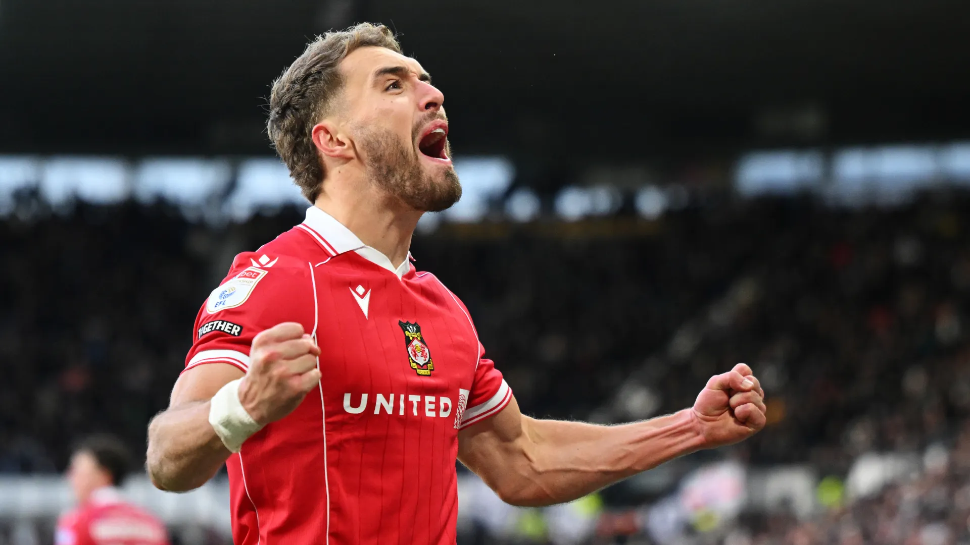 Sam Smith of Wrexham celebrates a goal. (Getty Images)