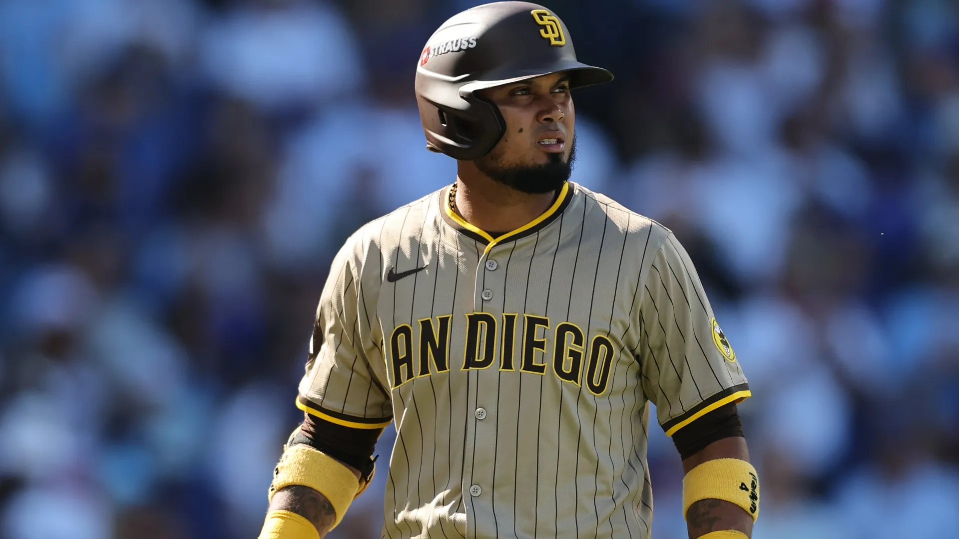 Luis Arraez #4 of the Padres reacts during Game One of the NL Wild Card Series. Michael Reaves/Getty Images.