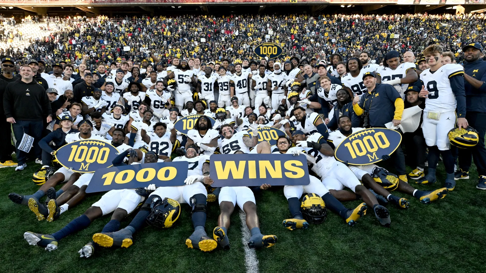 The Michigan Wolverines celebrate the 1000th win in program history in 2023 (Source: Greg Fiume/Getty Images)