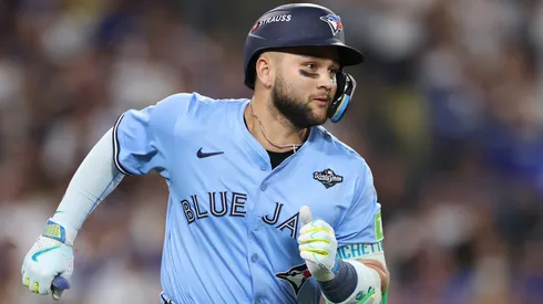 Bo Bichette #11 of the Blue Jays hits an RBI single during the game five of the 2025 World Series.