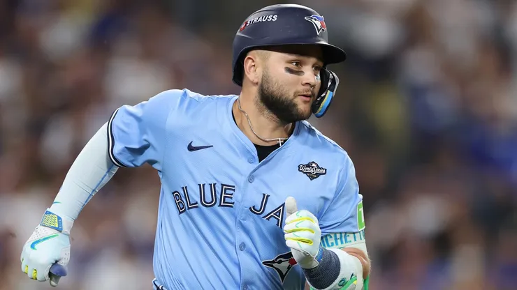 Bo Bichette #11 of the Blue Jays hits an RBI single during the game five of the 2025 World Series.