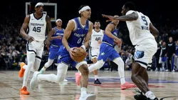 Anthony Black of the Magic runs with the ball during an NBA game against the Memphis Grizzlies in 2026.