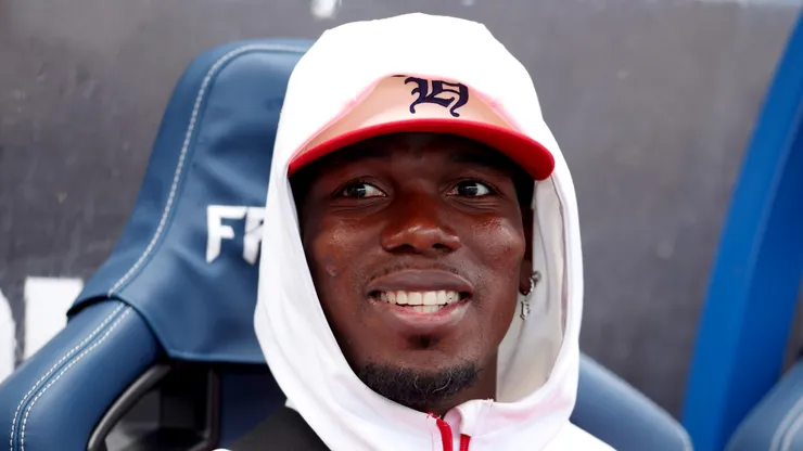 Paul Pogba looking from the bench.