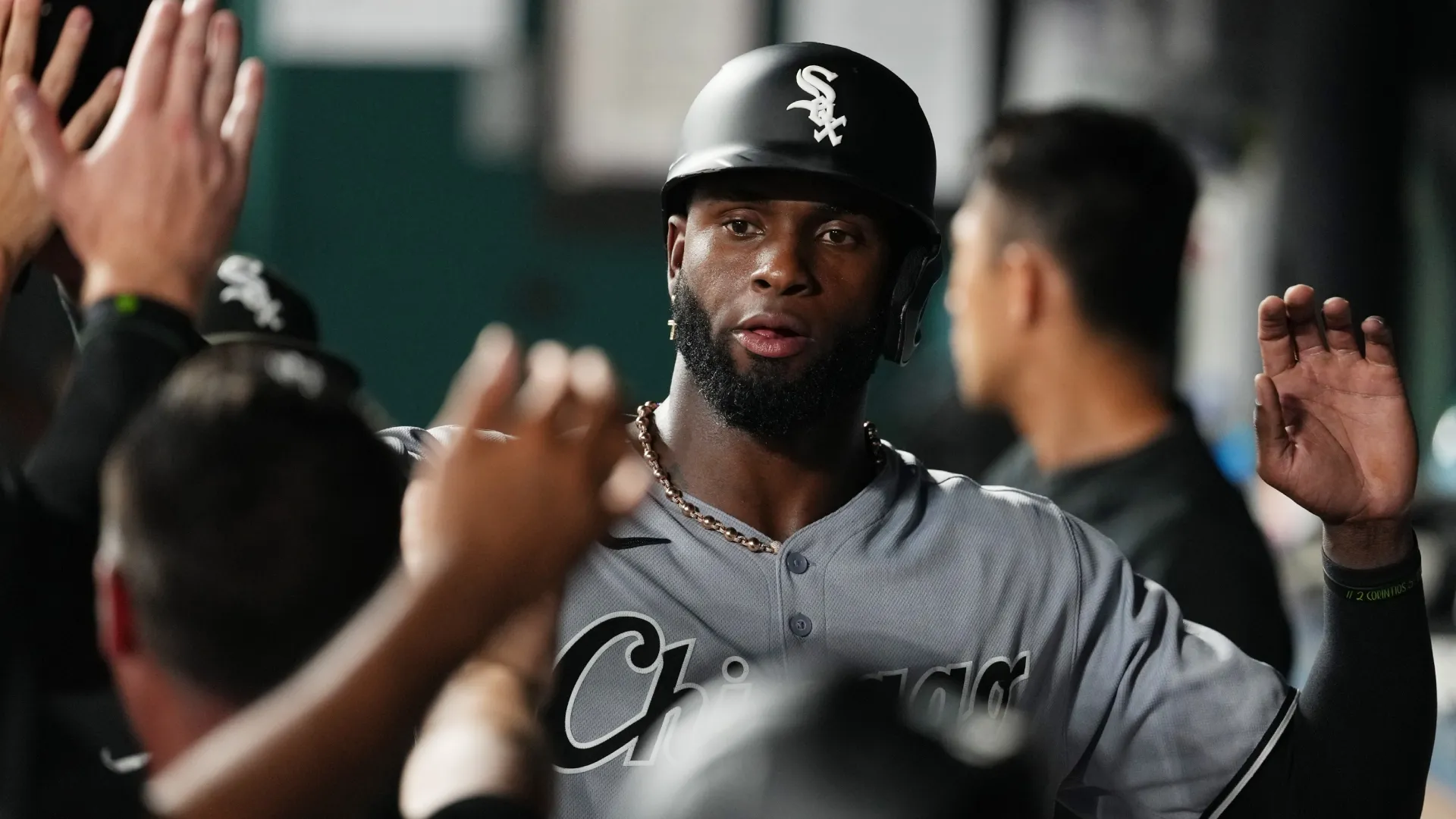 Luis Robert Jr. #88 with the White Sox celebrates after scoring. Ed Zurga/Getty Images