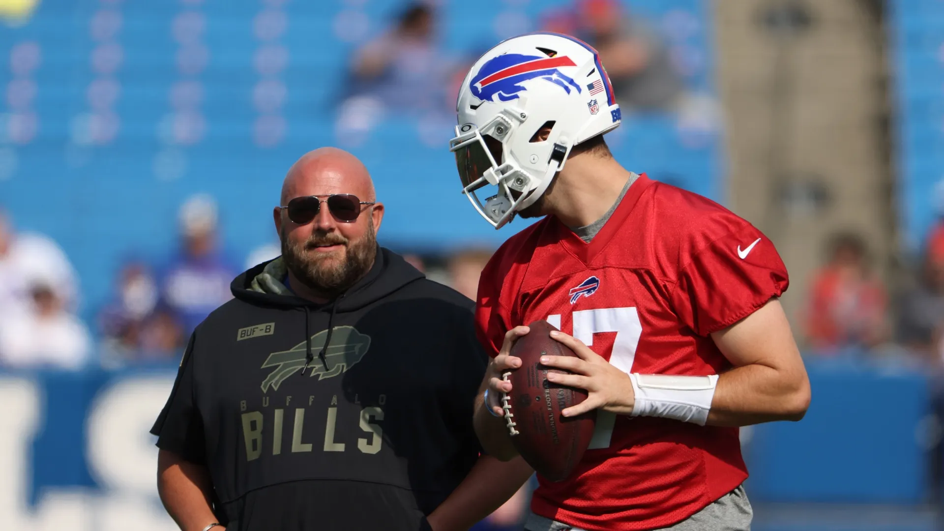 Brian Daboll (left) and Josh Allen before a Bills game.