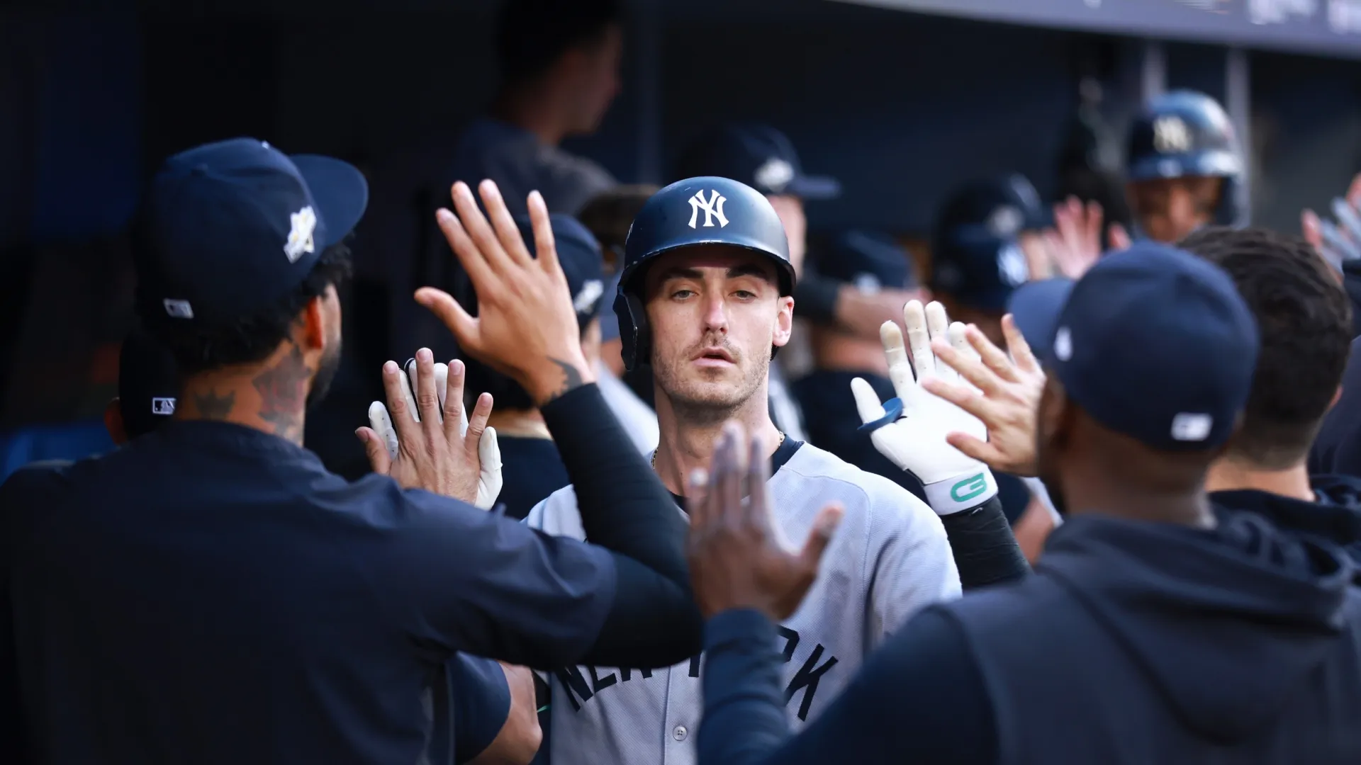 Cody Bellinger #35 of the Yankees celebrates with teammates. Vaughn Ridley/Getty Images
