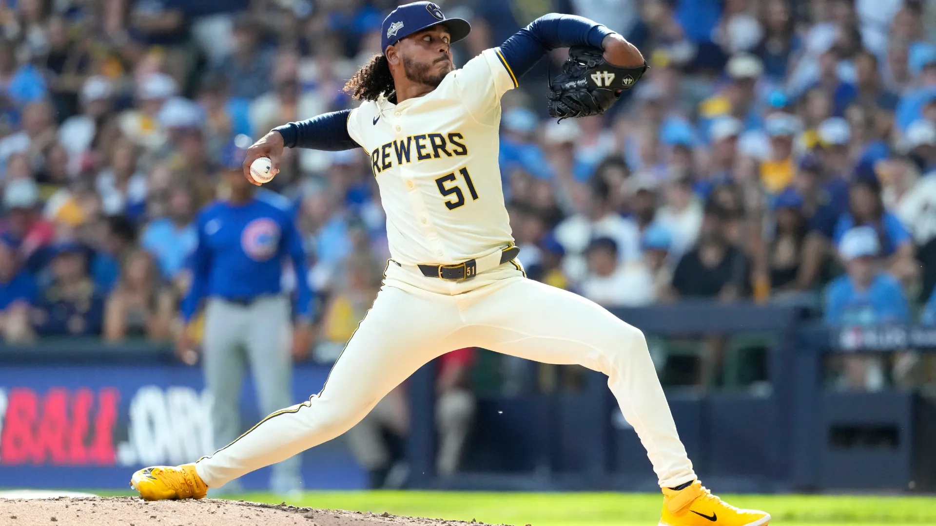 Freddy Peralta #51 with the Brewers pitches against the Cubs. John Fisher/Getty Images