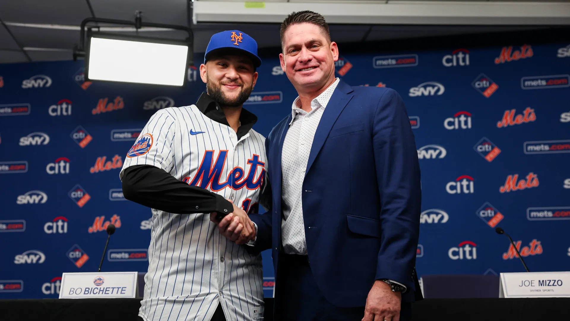 Bo Bichette #19 and Carlos Mendoza of the Mets during an introductory press conference. Ishika Samant/Getty Images)