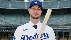 Kyle Tucker poses during his introductory press conference with the Dodgers.