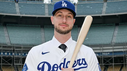 Kyle Tucker poses during his introductory press conference with the Dodgers.