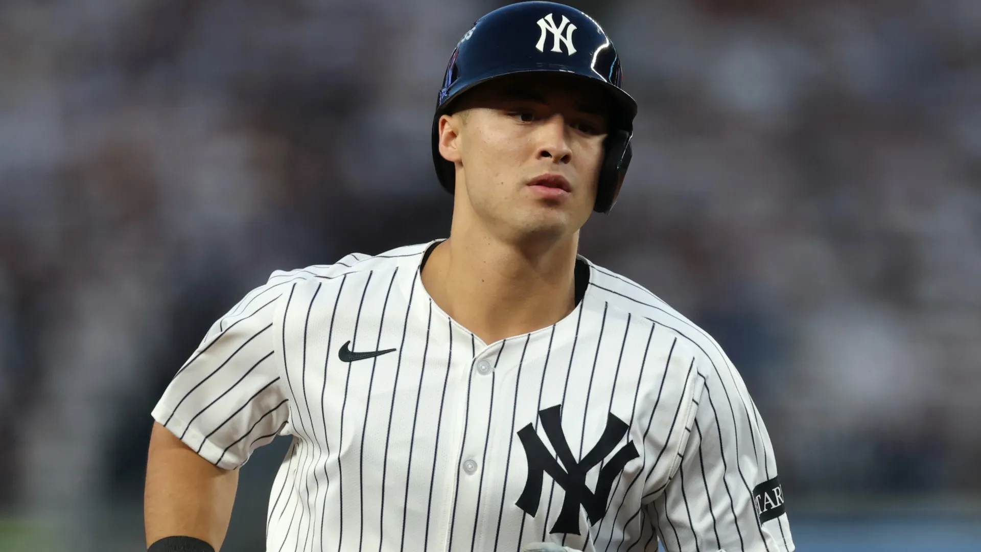 Anthony Volpe #11 of the Yankees runs around the bases after his solo home run. Ishika Samant/Getty Images