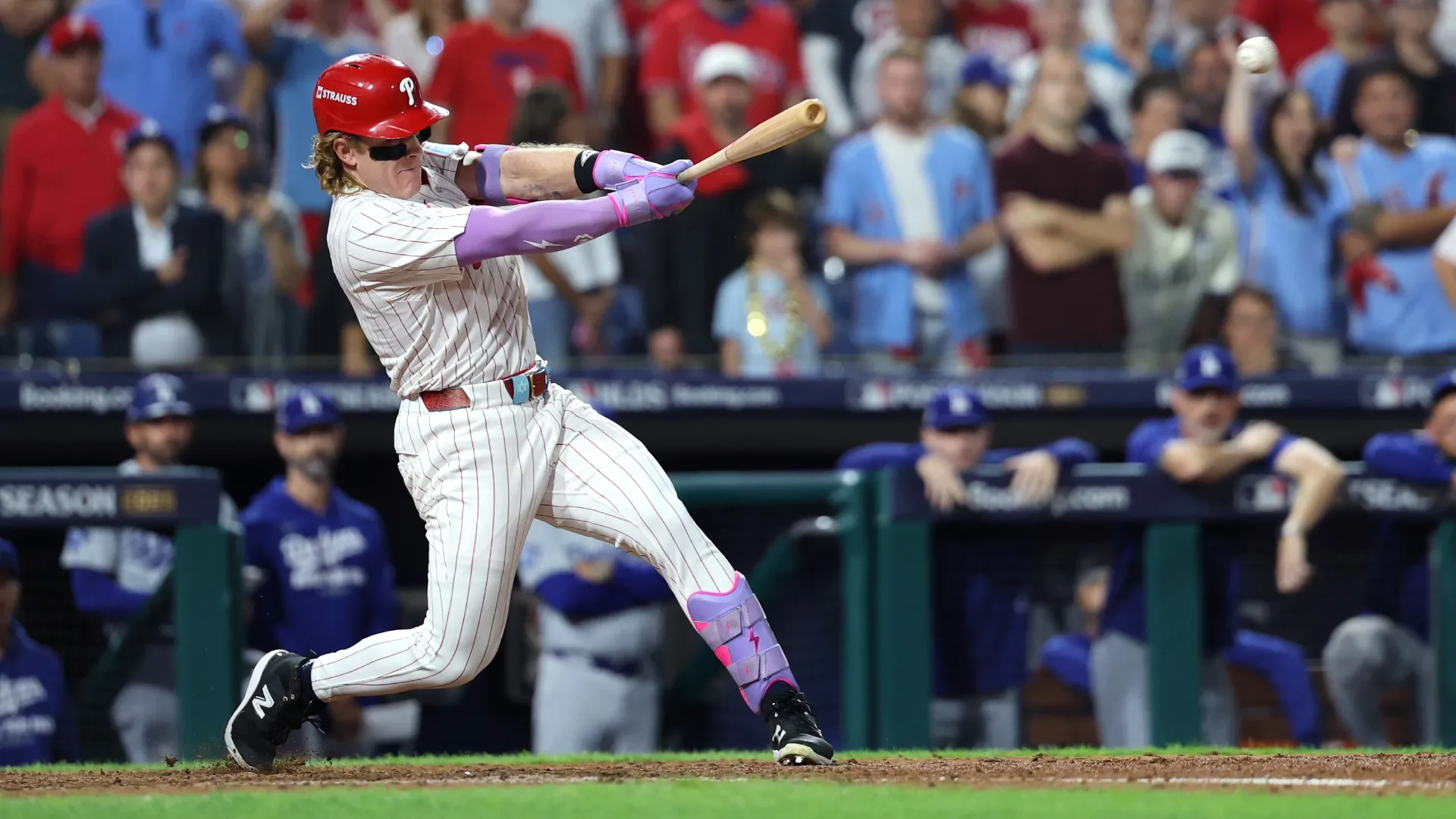 Harrison Bader #2 of the Phillies hits a single against the Dodgers. Emilee Chinn/Getty Images