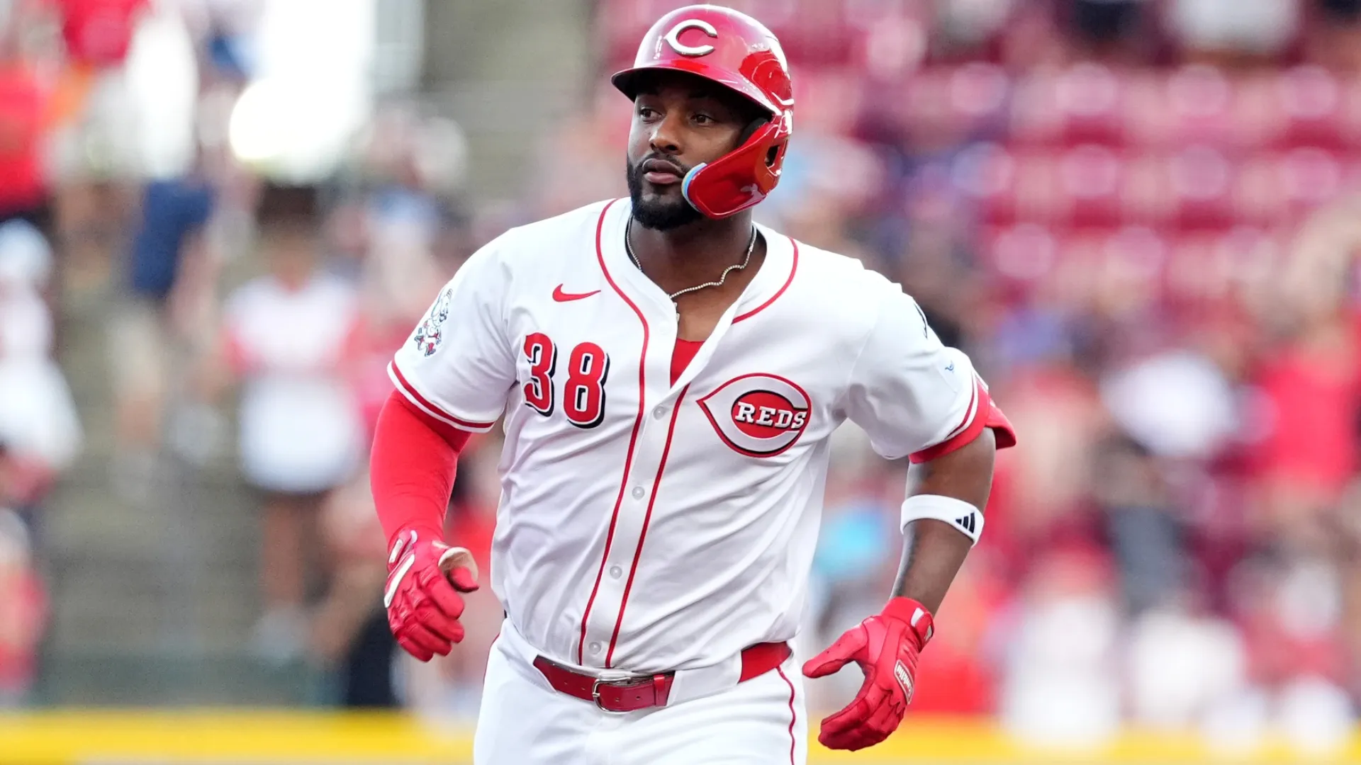Miguel Andujar #38 of the Reds runs the bases after hitting a grand slam home run. Jason Mowry/Getty Images