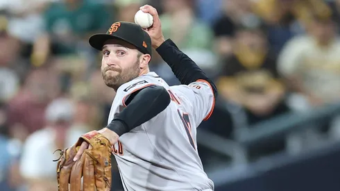 Casey Schmitt throws to first base on August 18, 2025 in San Diego.