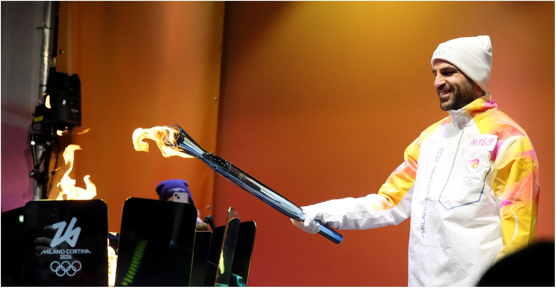 Cesc Fabregas, Head Coach of Como 1907, holds the Olympic Flame – Vittorio Zunino Celotto/Getty Images