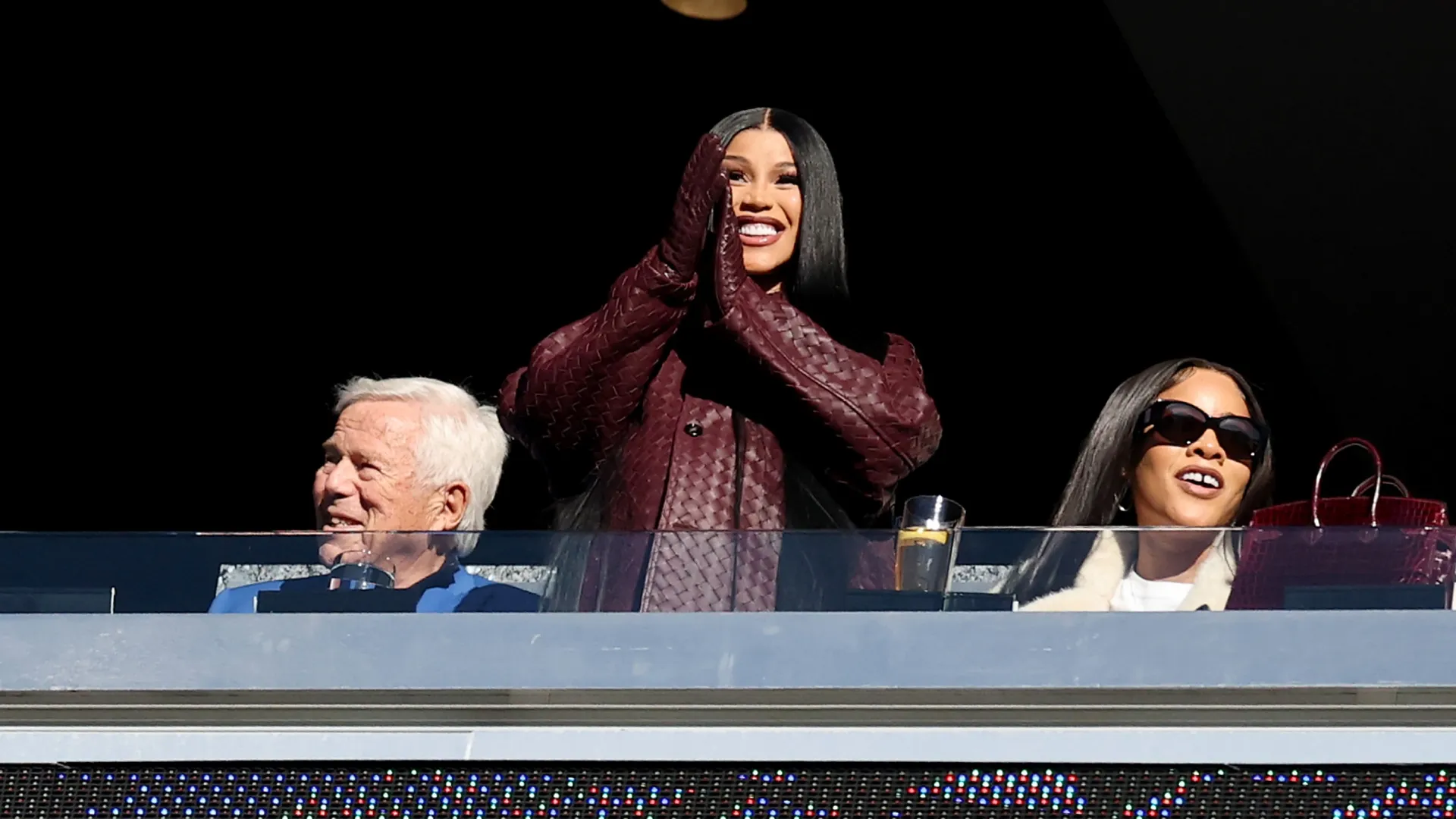 Cardi B acknowledges the crowd during the game between the Falcons and the Patriots in 2025 (Source: Maddie Meyer/Getty Images)