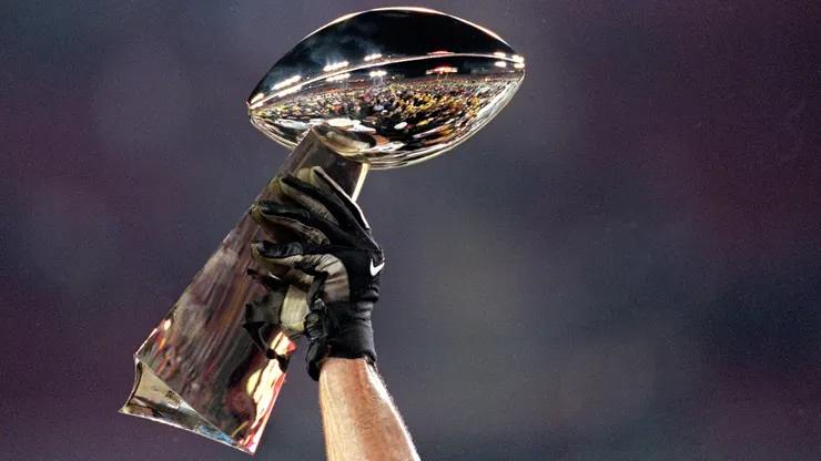 A general view of the Lombardi Trophy being held aloft before the Super Bowl XXXV Game.