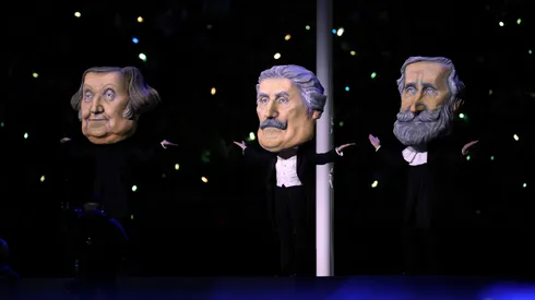 Actors dressed as great masters during the opening ceremony of the Milano Cortina 2026 Winter Olympics.