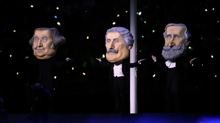 Actors dressed as great masters during the opening ceremony of the Milano Cortina 2026 Winter Olympics.