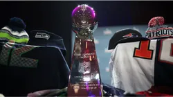 The Vince Lombardi Trophy with Seattle Seahawks and New England Patriots jerseys