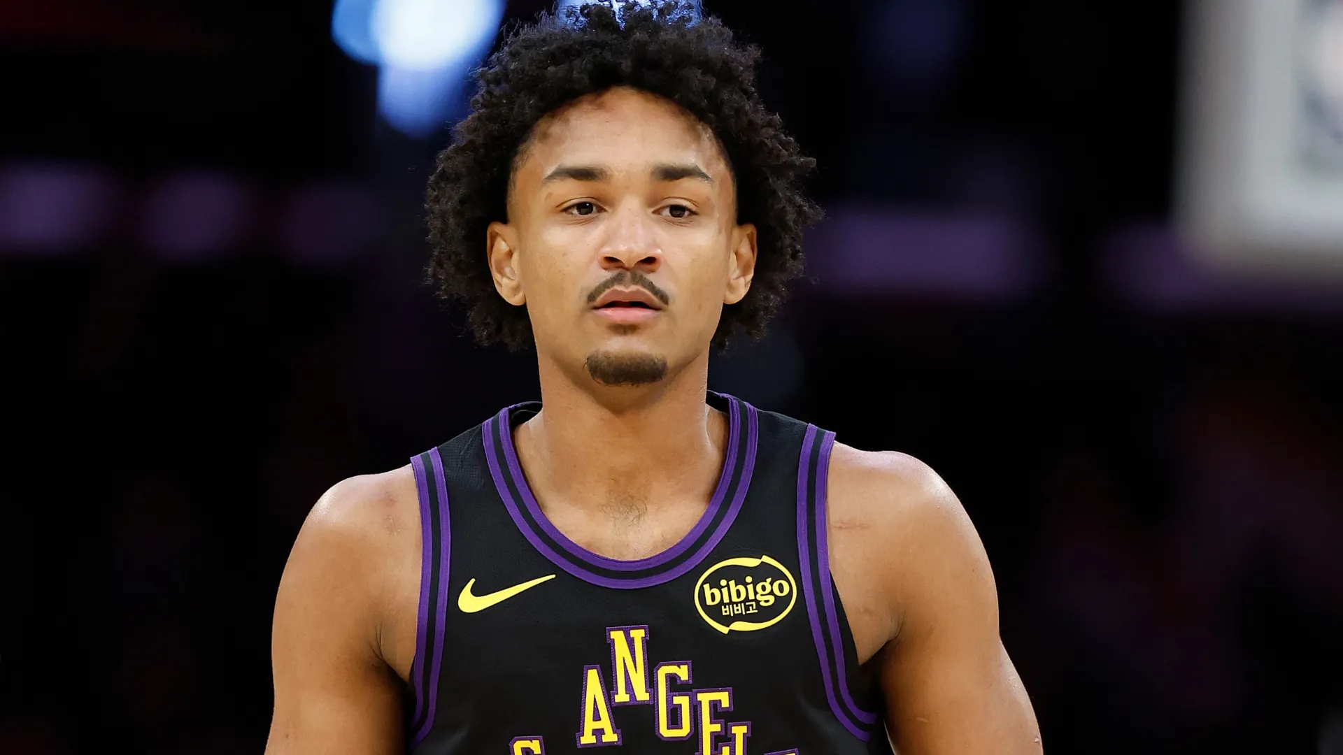 Kobe Bufkin looks on