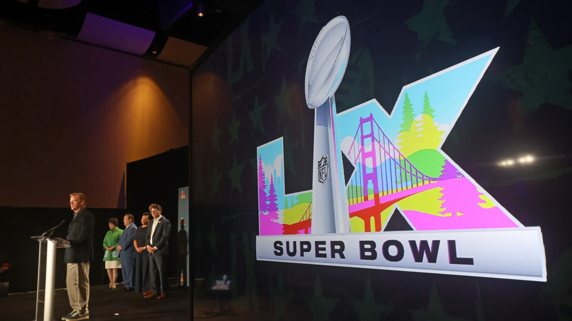 The Super Bowl LX logo is unveiled as NFL Commissioner Roger Goodell speaks in 2026. (Source: Michael DeMocker/Getty Images)